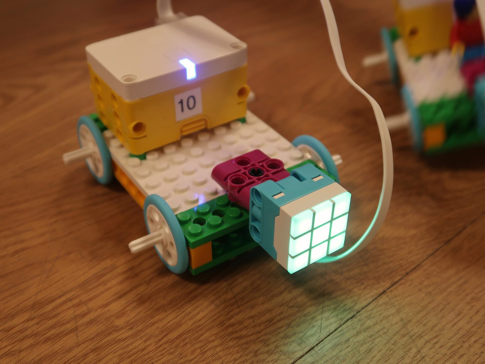 A LEGO car with a light-up sensor